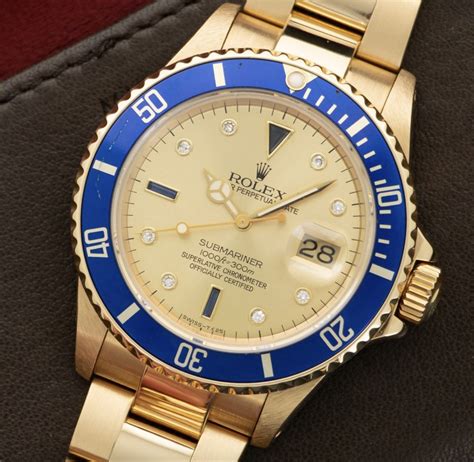 rolex 18k yellow gold sapphire|rolex submariner yellow gold.